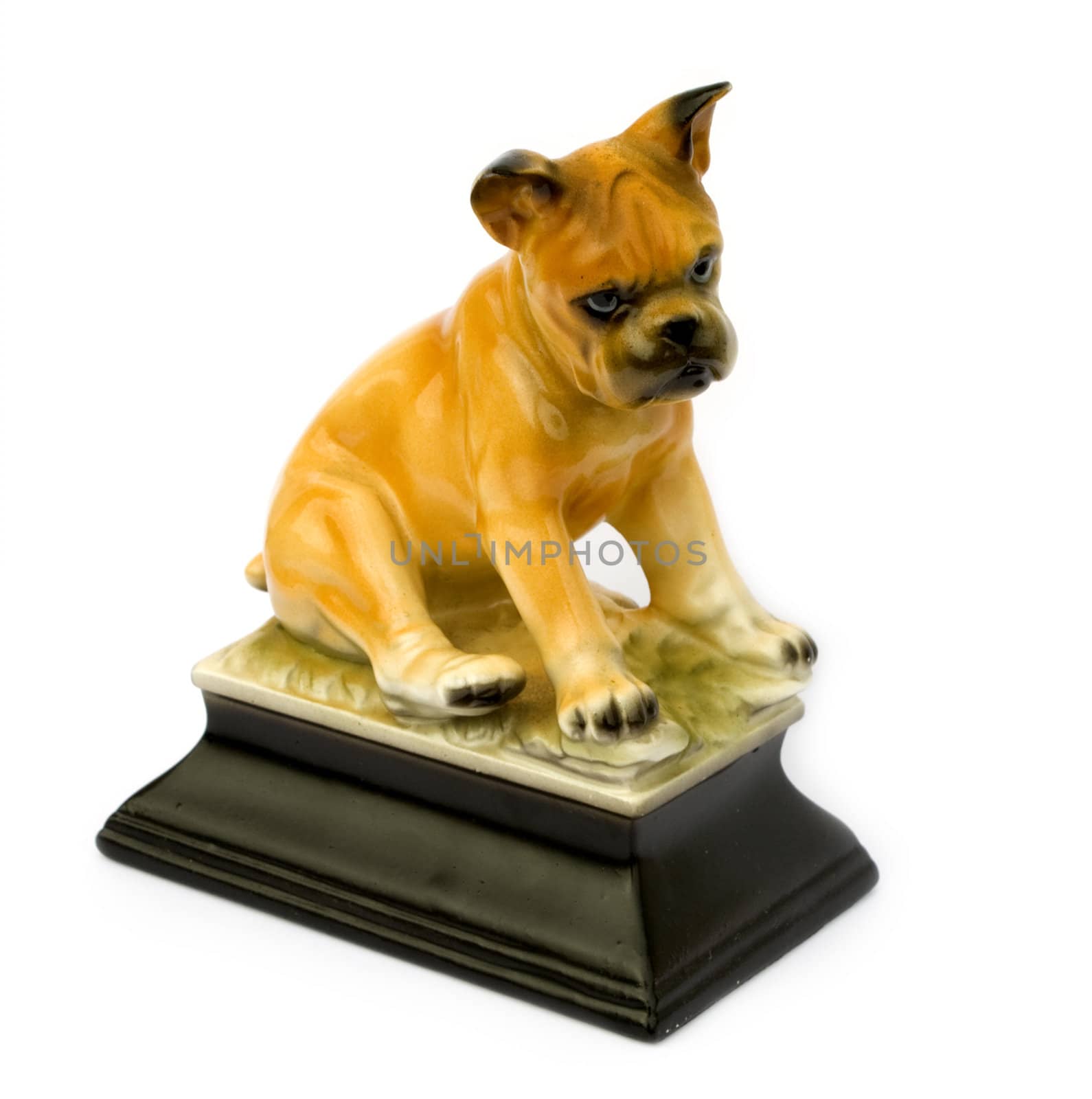 Retro vintage figurine of a boxer puppy isolated on white background