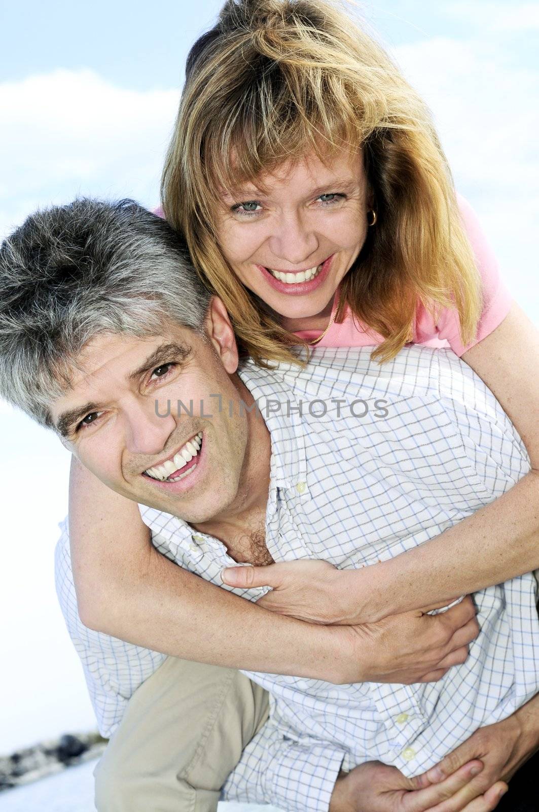Mature romantic couple of baby boomers enjoying outdoors