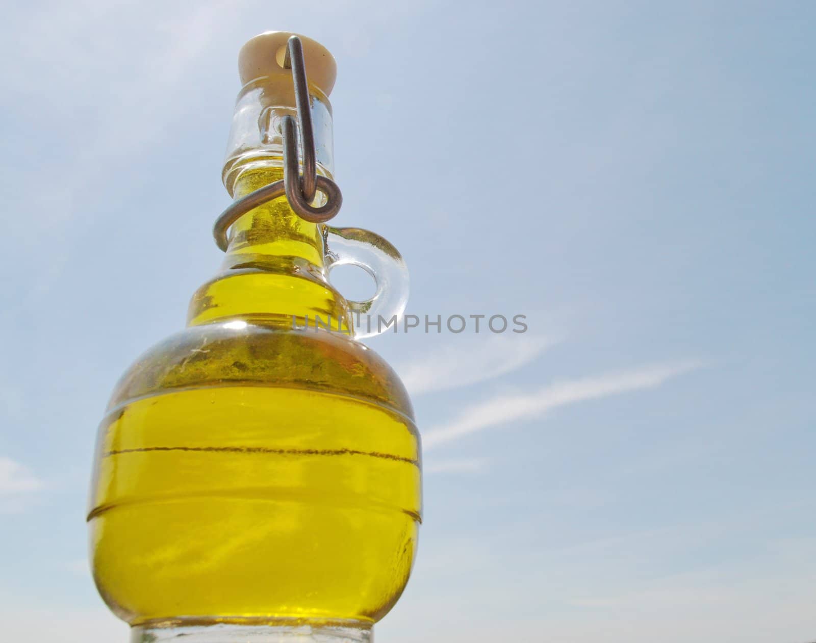 Small bottle of Olive Oil by rigamondis