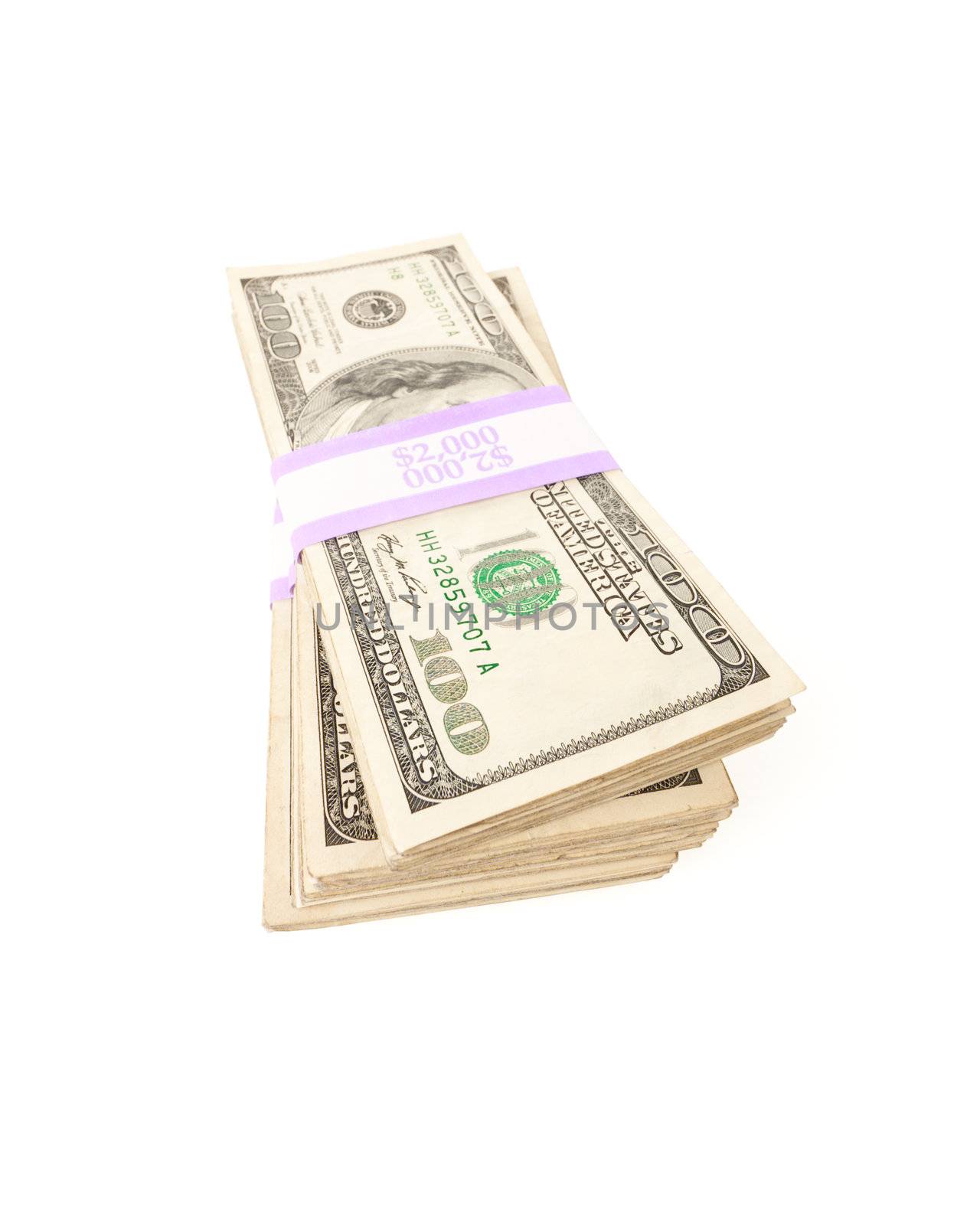 Stacks of Two Thousand Dollar Piles of One Hundred Dollar Bills Isolated on a White Background.