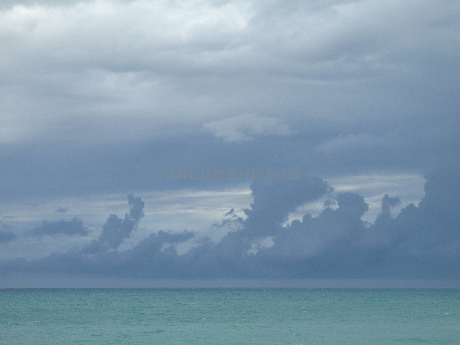 turquoise ocean and dark blue sky