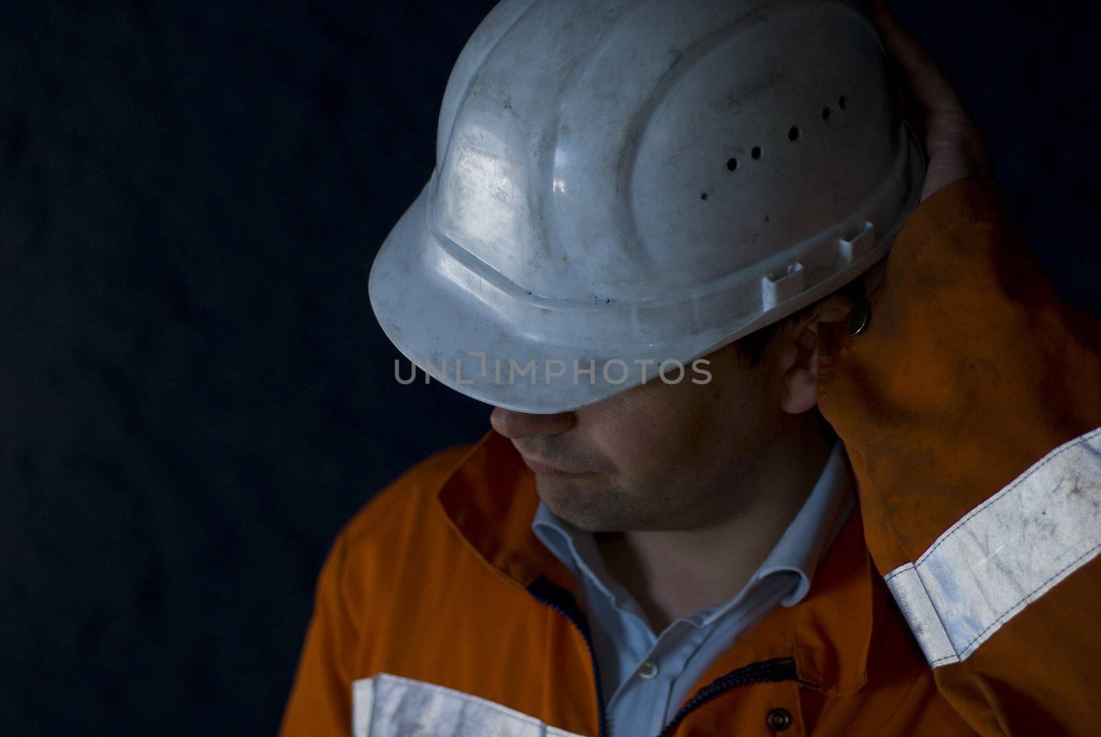 Construction underground worker facing unsolvable problem