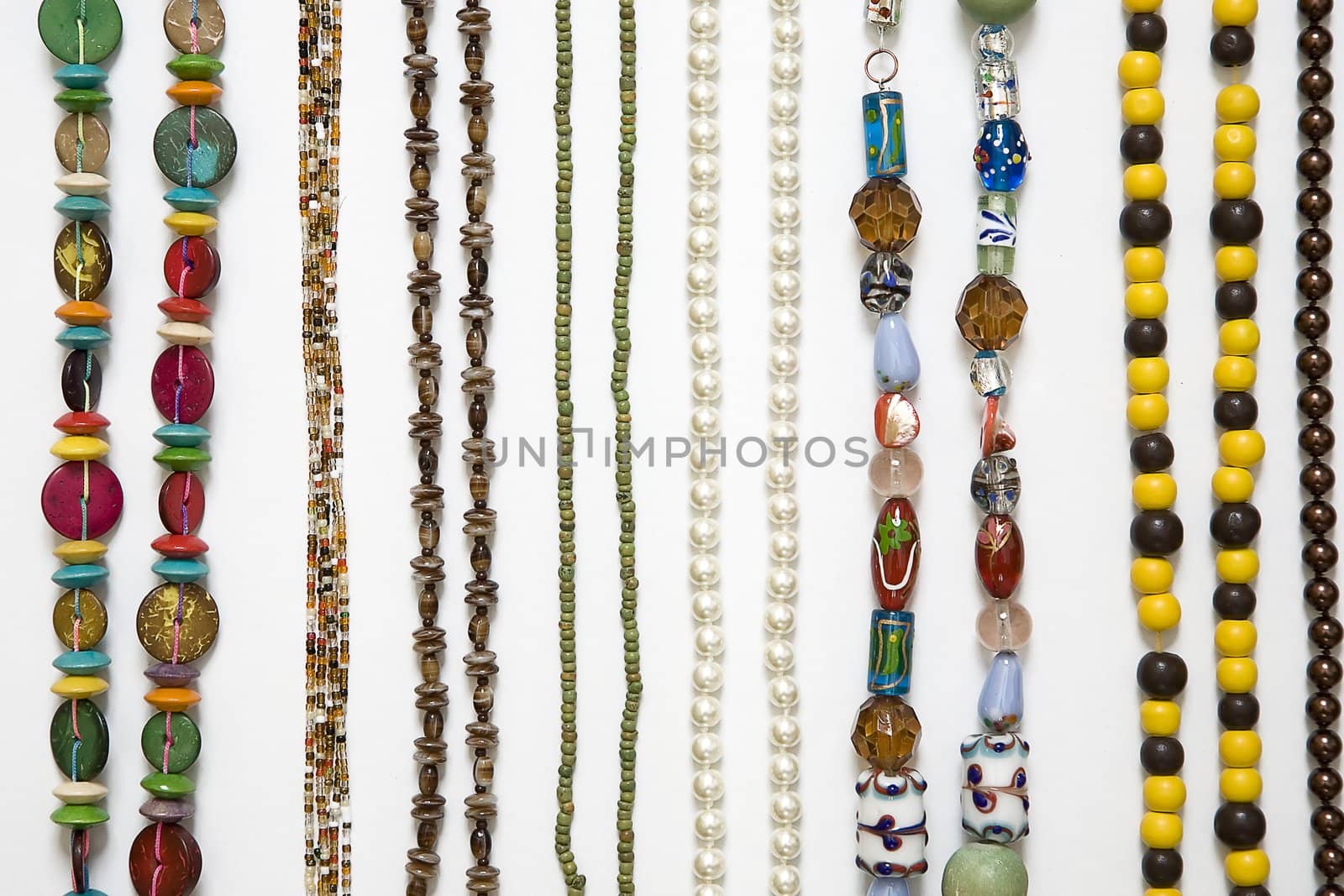 coloured chain of beads, arranged in a vertical strips