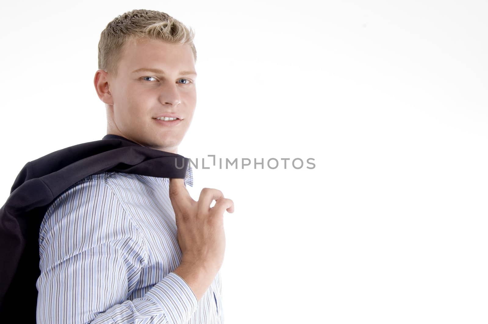 side view of man holding coat on an isolated white background