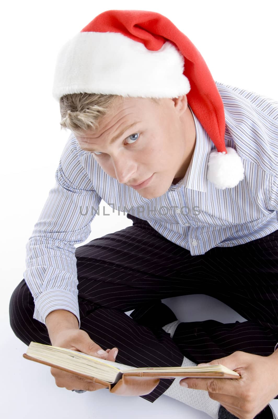 man holding book and looking upward on an isolated white background
