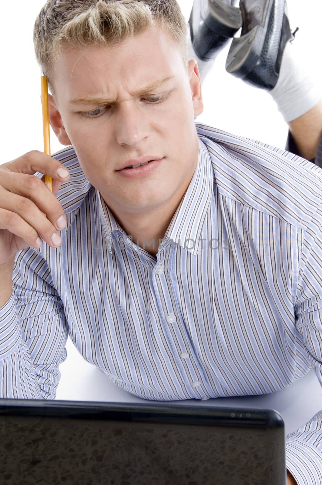 man thinking with pencil and notepad