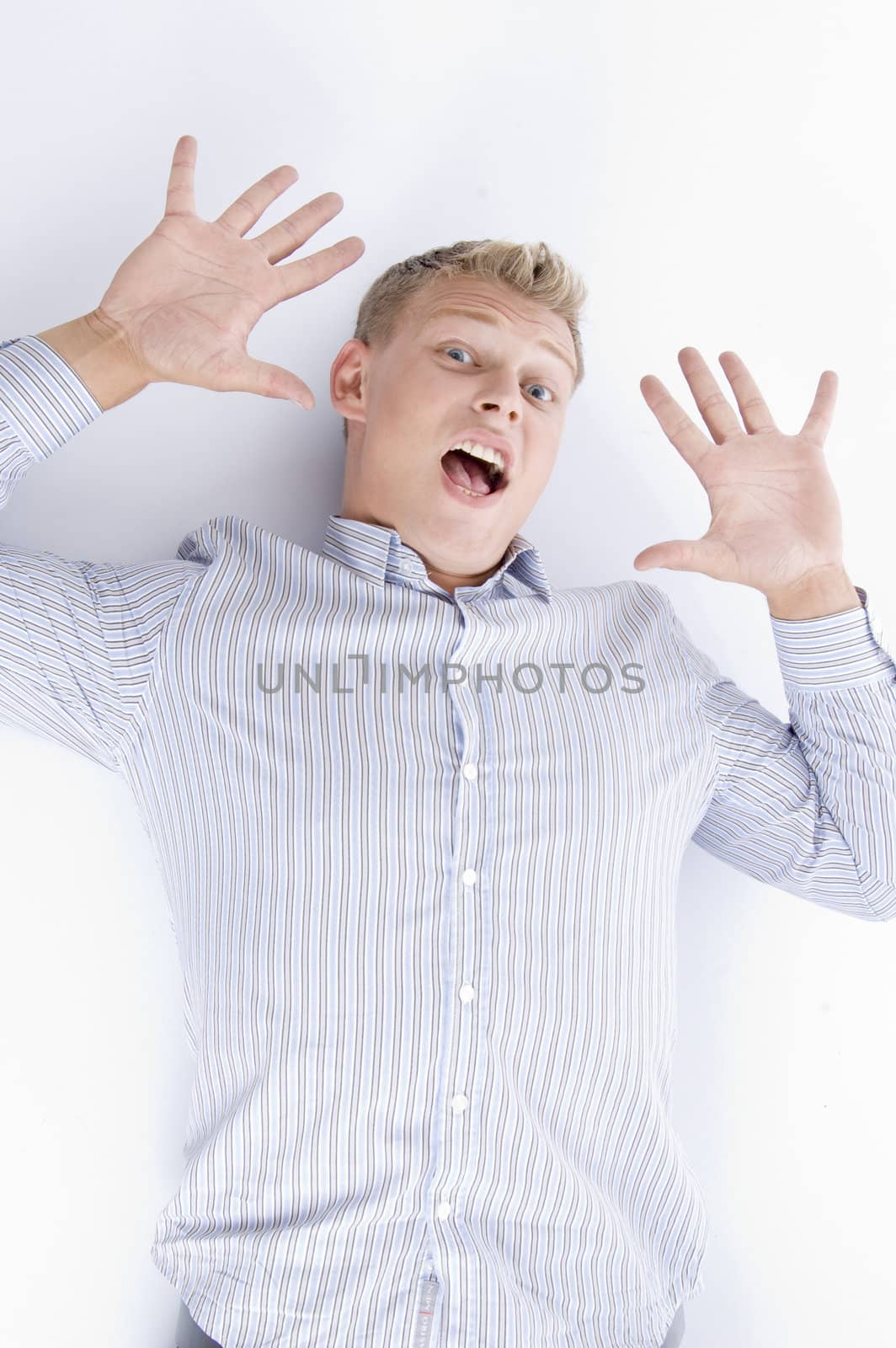 screaming young handsome male against white background