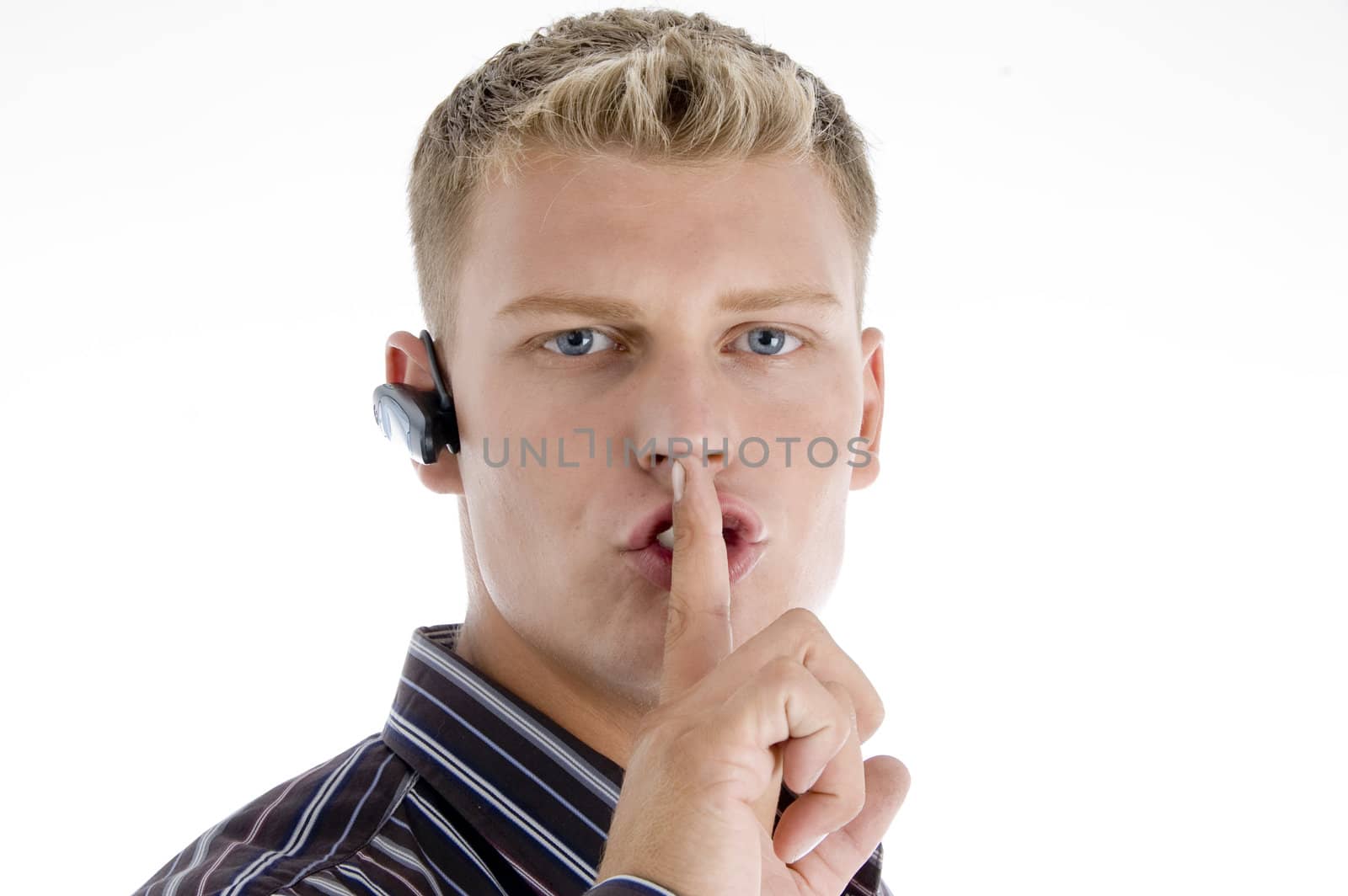 handsome male shushing isolated on white background