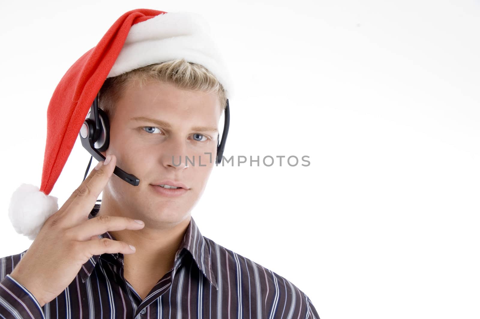 american man wearing headphone and santa hat isolated on white background