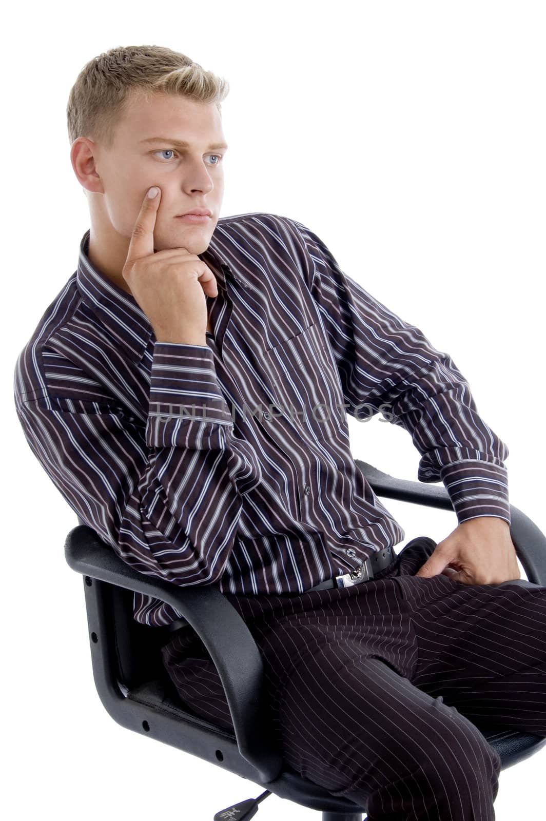 young caucasian sitting on chair thinking isolated with white background