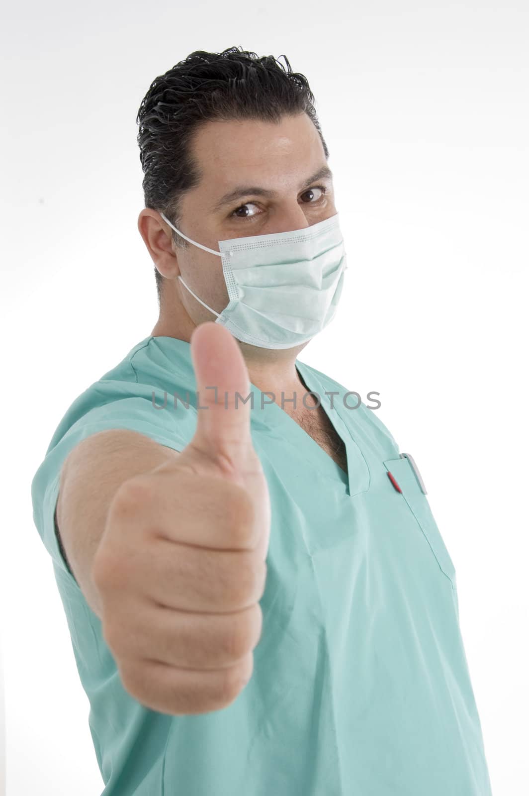 doctor with mask on his mouth showing thumb gesture against white background