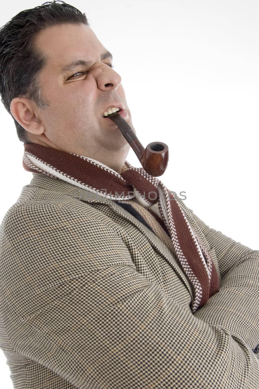 man posing with cigar in his mouth on an isolated background
