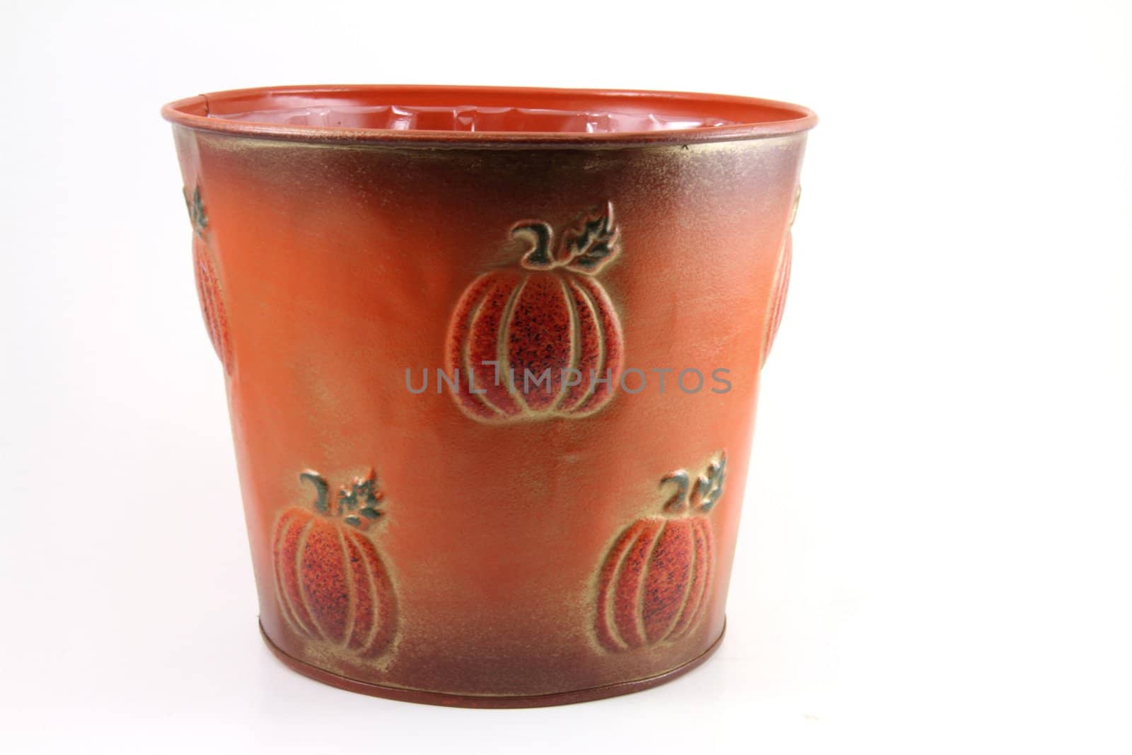 An orange bucket adorned with pumpkins on a white background