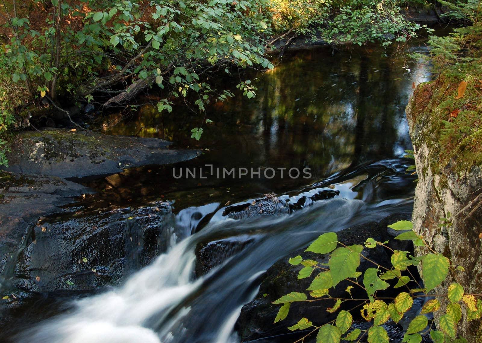 Picture of a small water fall taken with a slow shutter speed