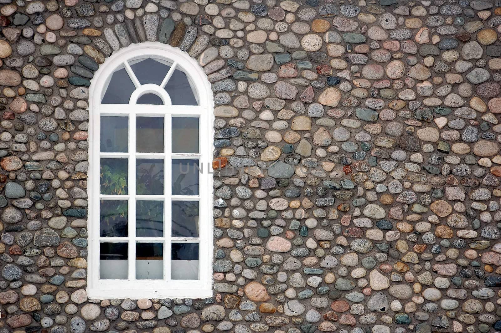 Picture of a window on a stone wall