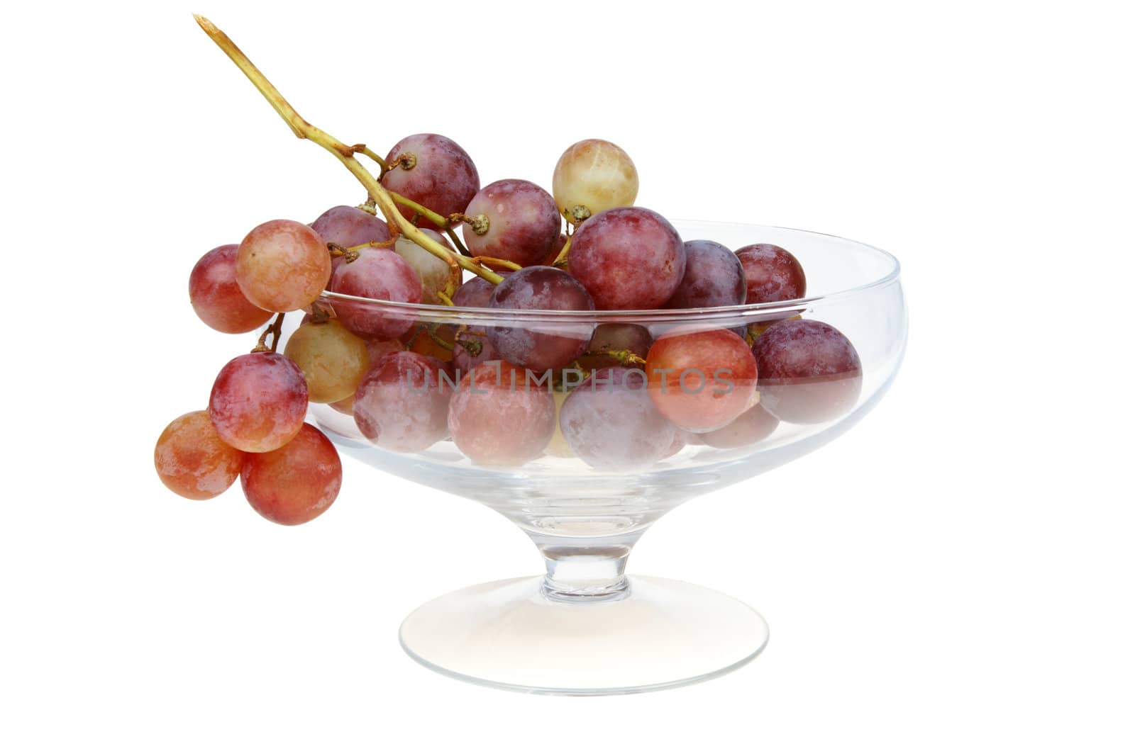 red grapes in glass isolated with clipping path.