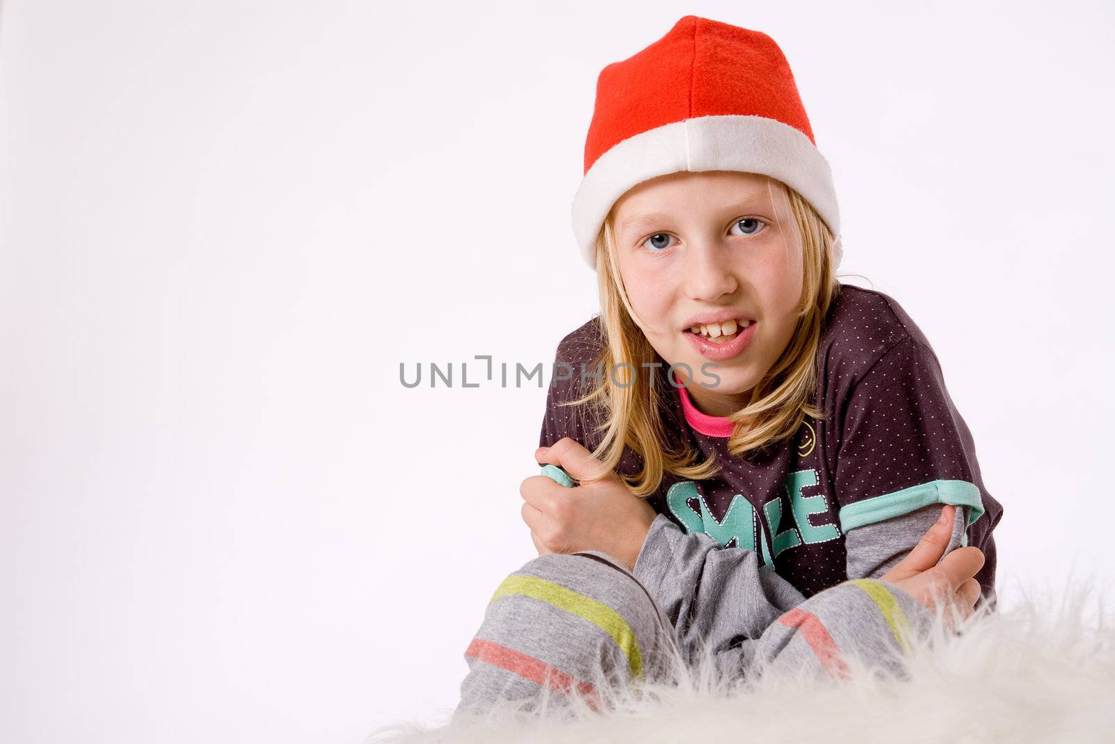 Happy blond girl and her christmas thoughts