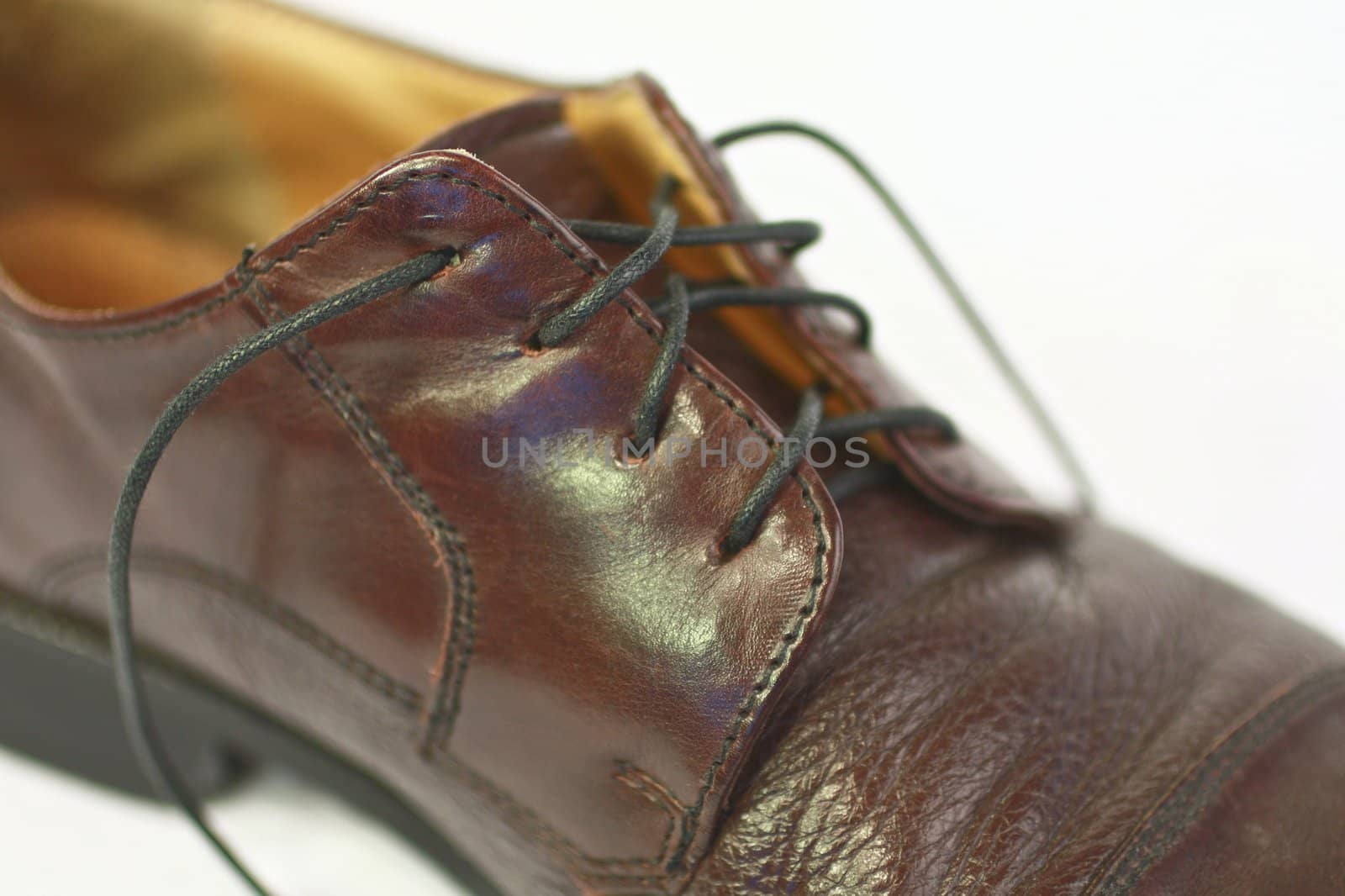 Mens brown shoe with black shoe string