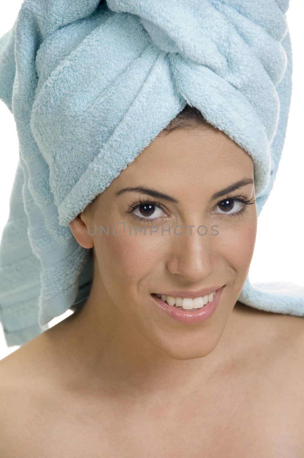 portrait of a woman with a towel on her head  on an isolated white background