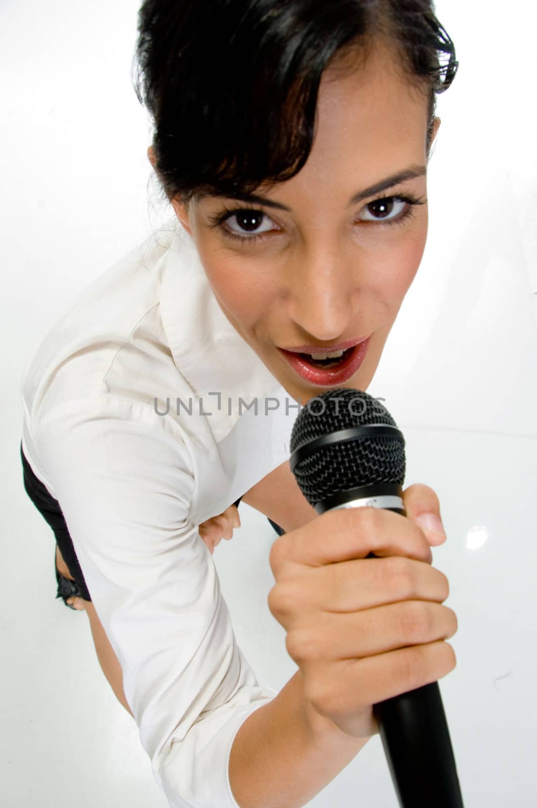 ariel view of female singer performing on an isolated white background