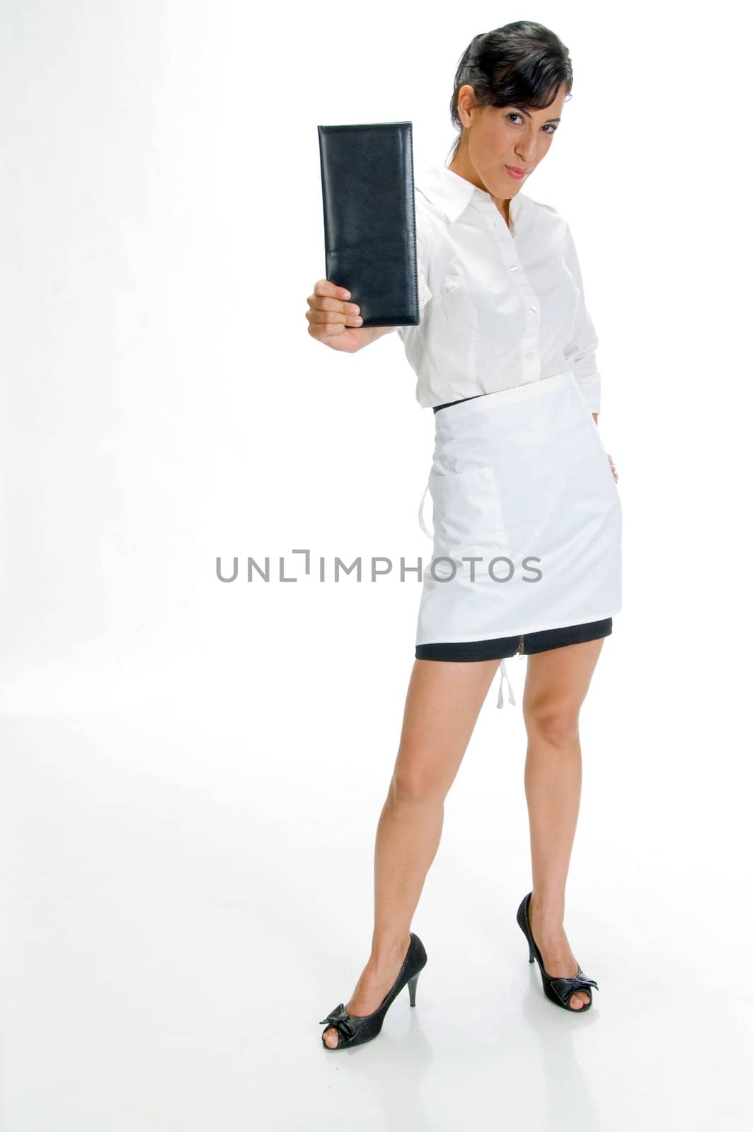 beautiful waitress standing and showing check book on an isolated background