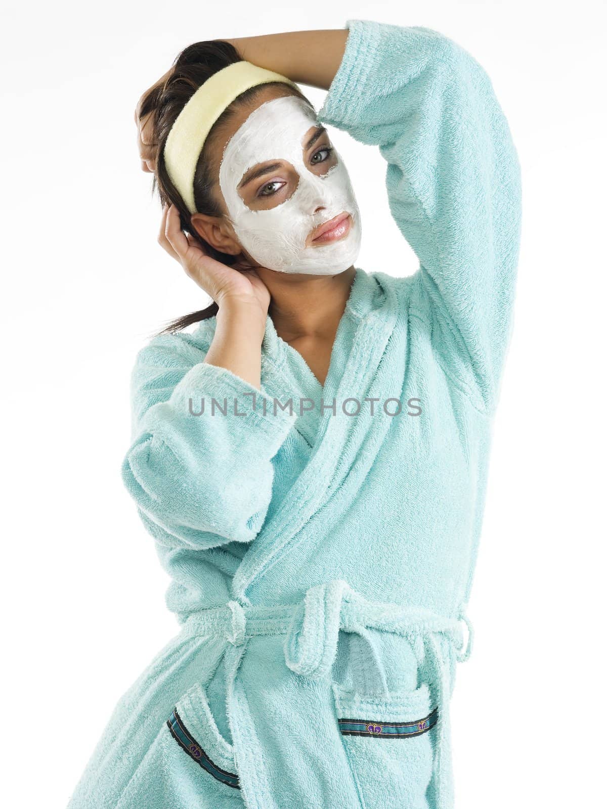 cute and nice girl with face cream mask and posing