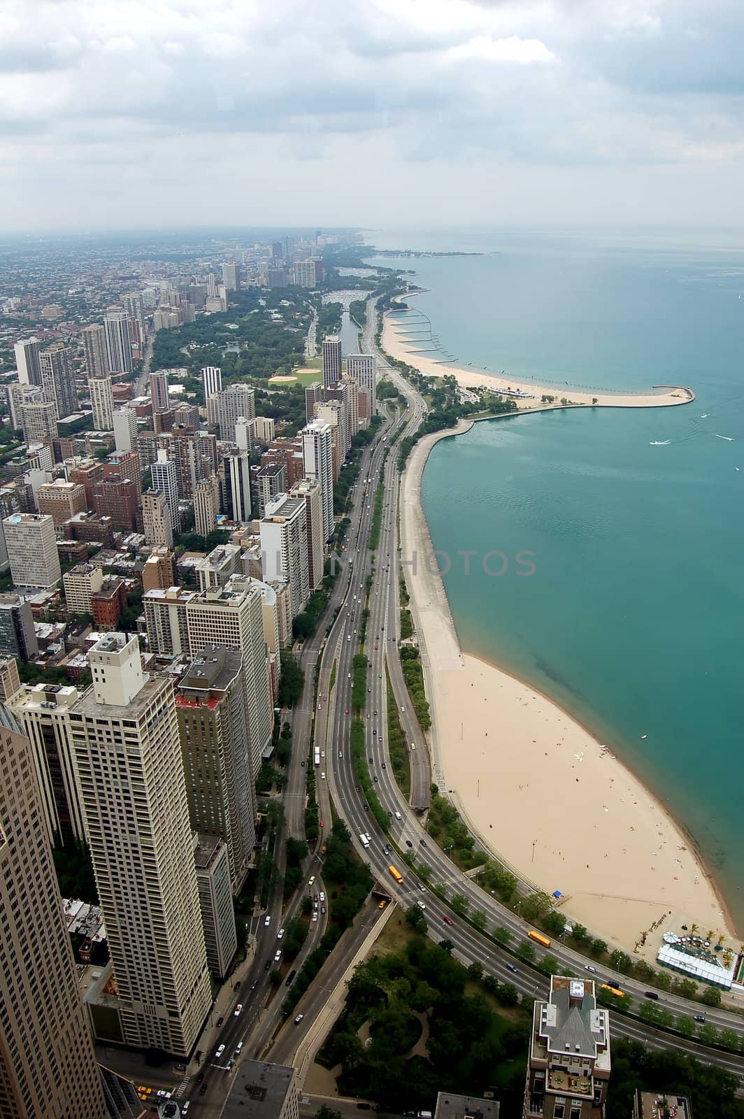 A view of Chicago looking north from the top of a skyscraper