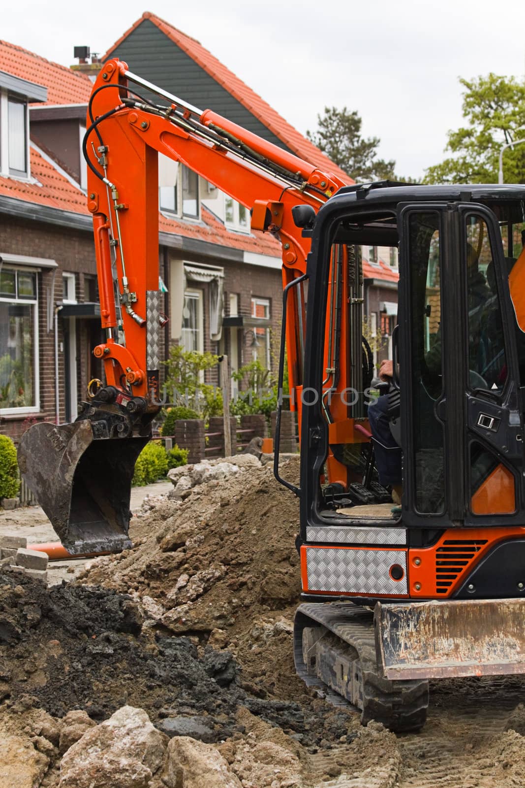 Breaking up the street to renew the sewerage - vertical image