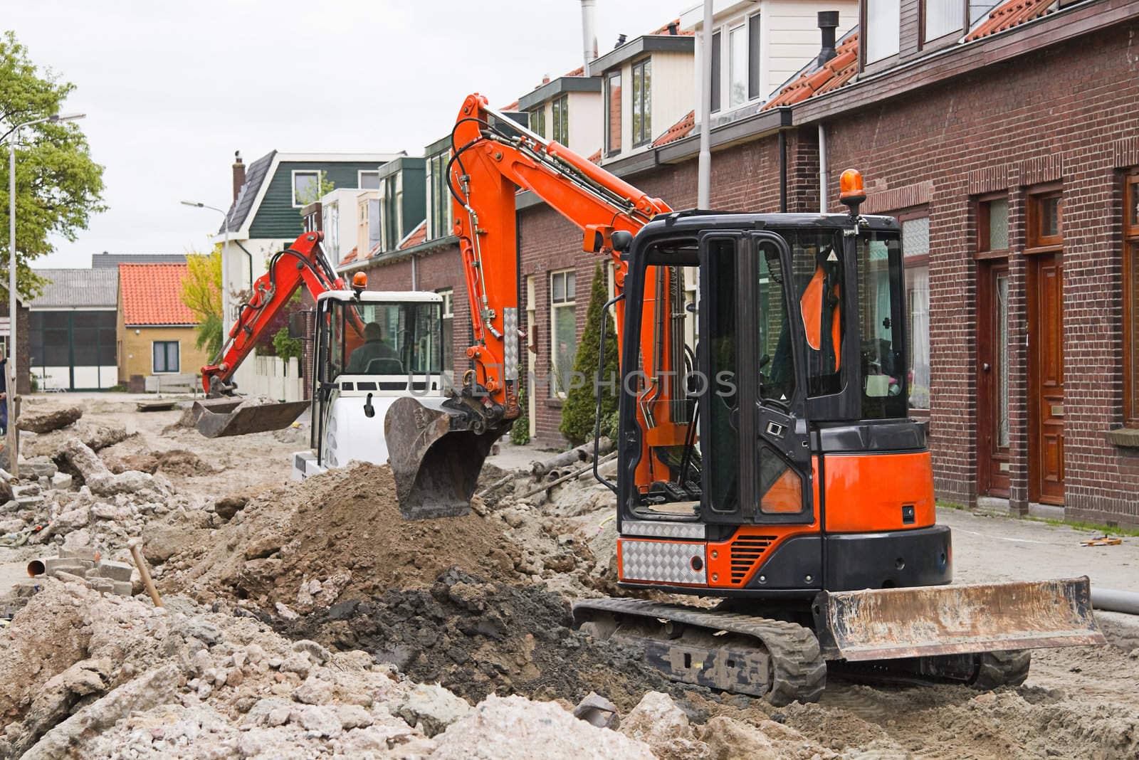 Breaking up the street to renew the sewerage  by Colette