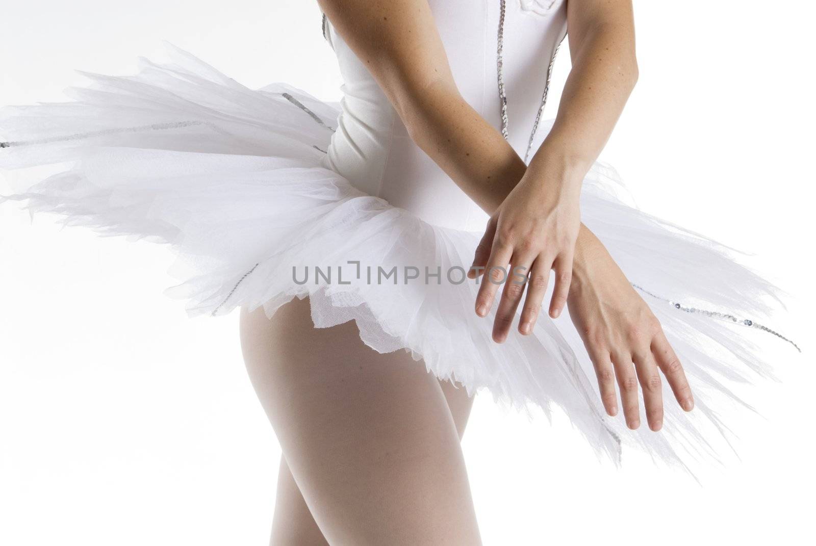 dancer in a white tutu on a white background