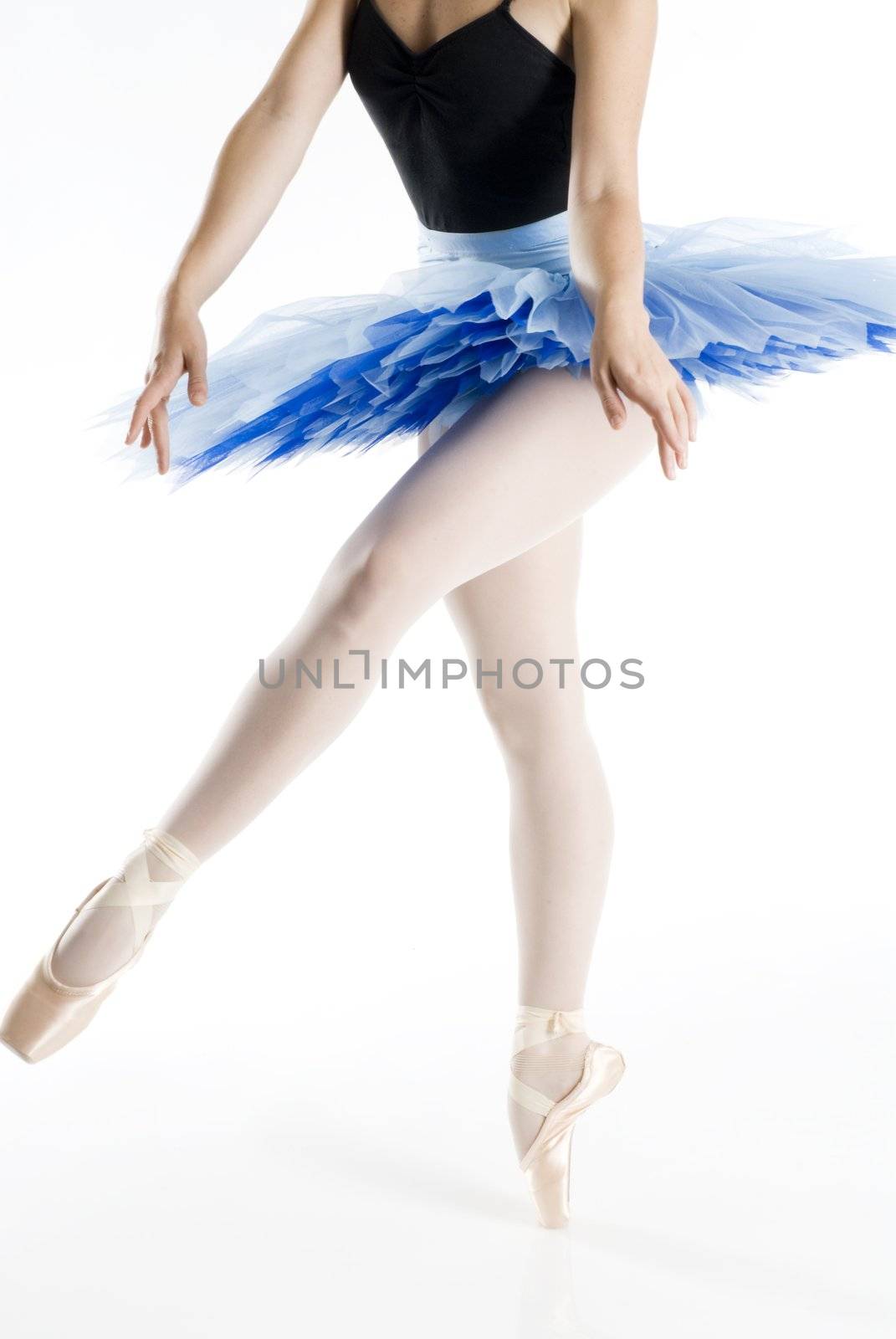 dancer i blue tutu dancing in pointe