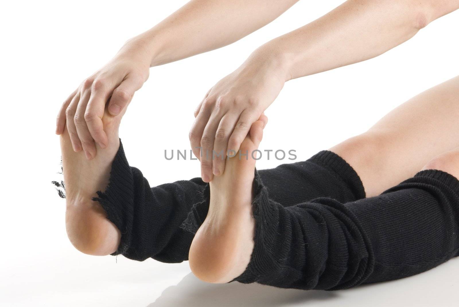 legs in black knee socks warming up