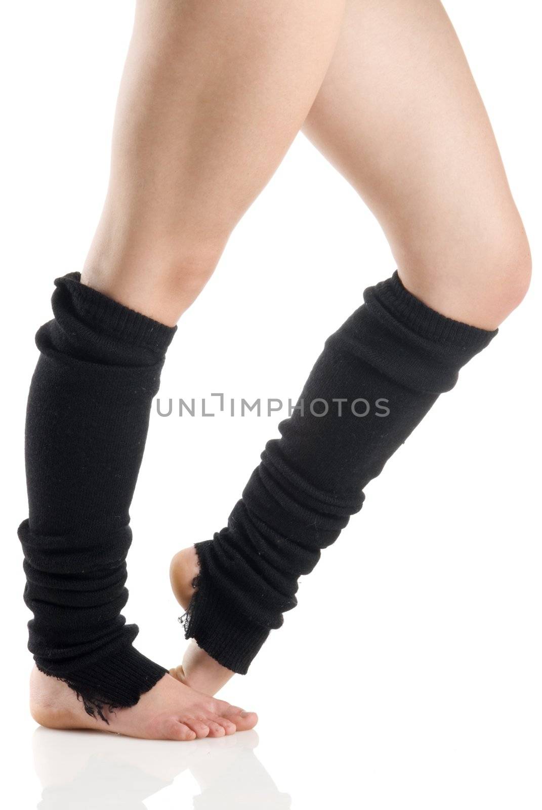 legs in black knee socks warming up