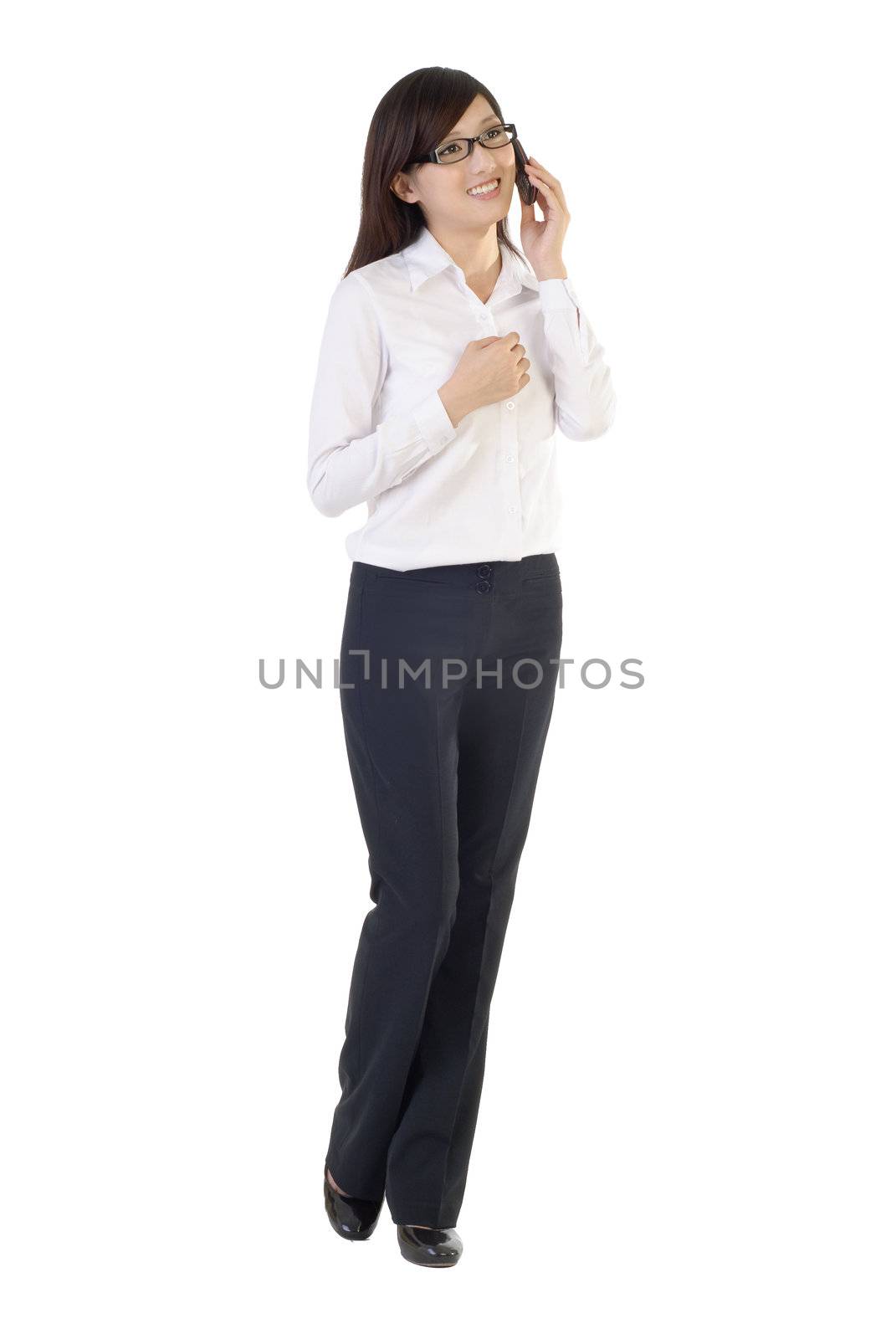 Asian business woman with cellphone by elwynn