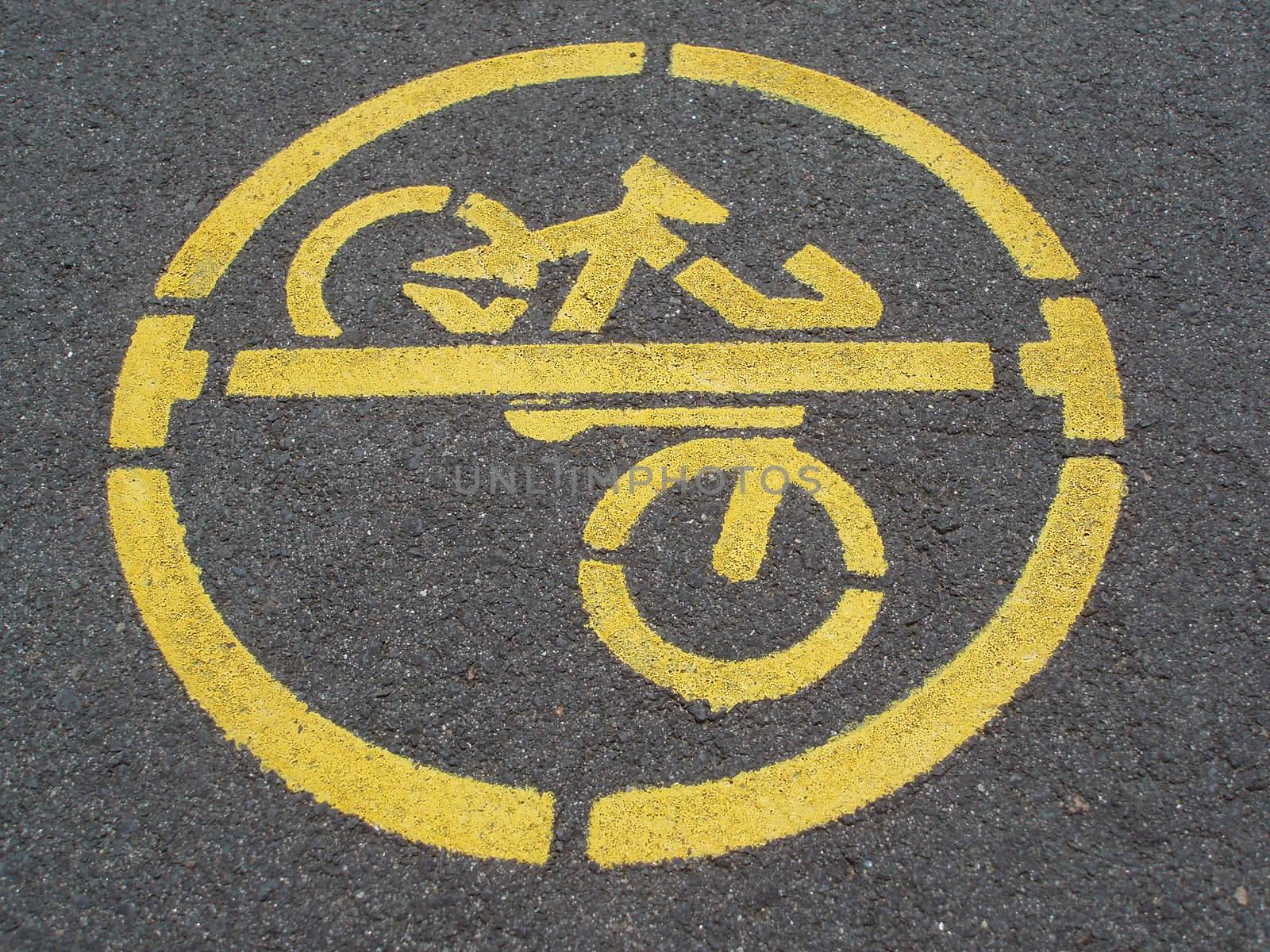 no cycling sign stencilled on a pavement