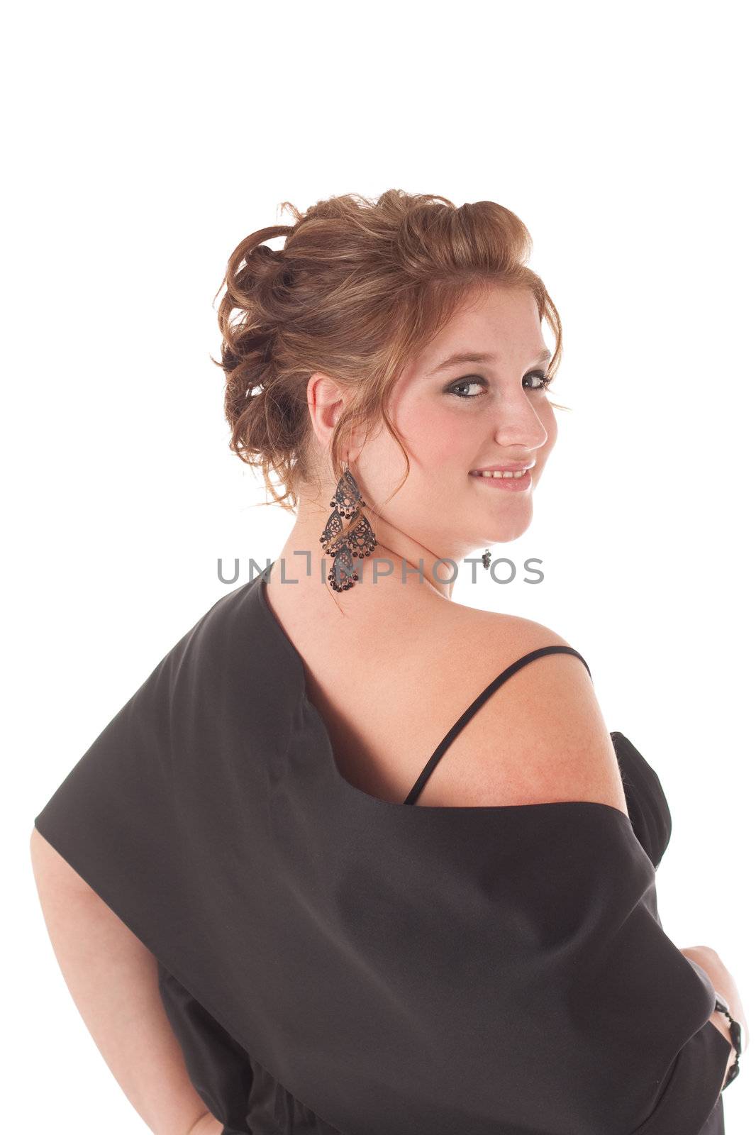 Teenage girl in black formal dress, isolated on white