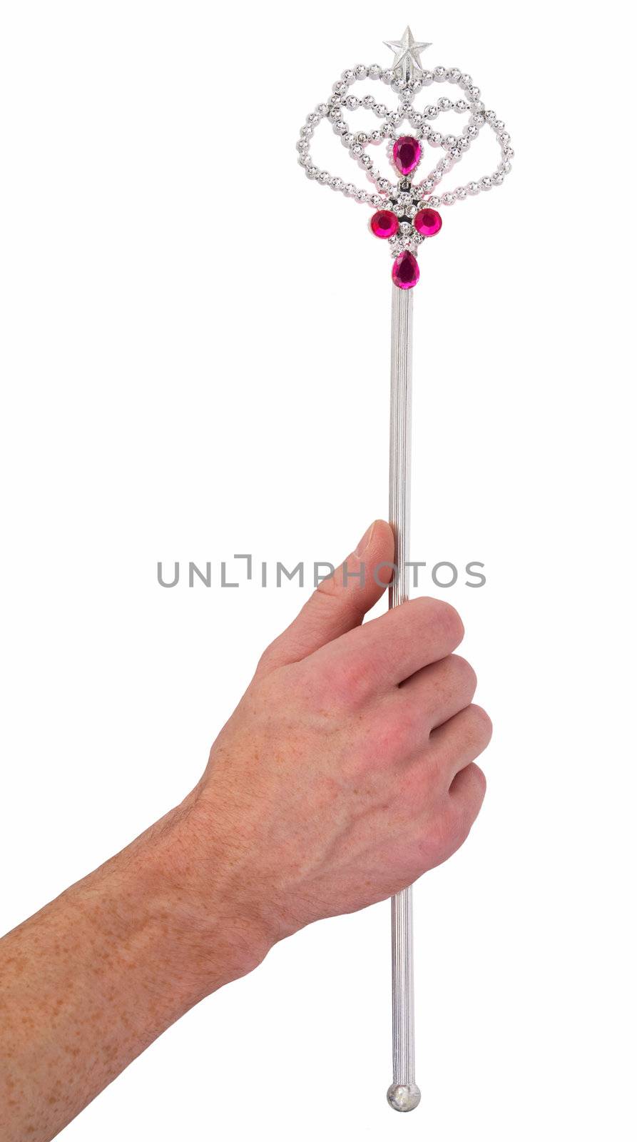 Magic wand in the hand on white background