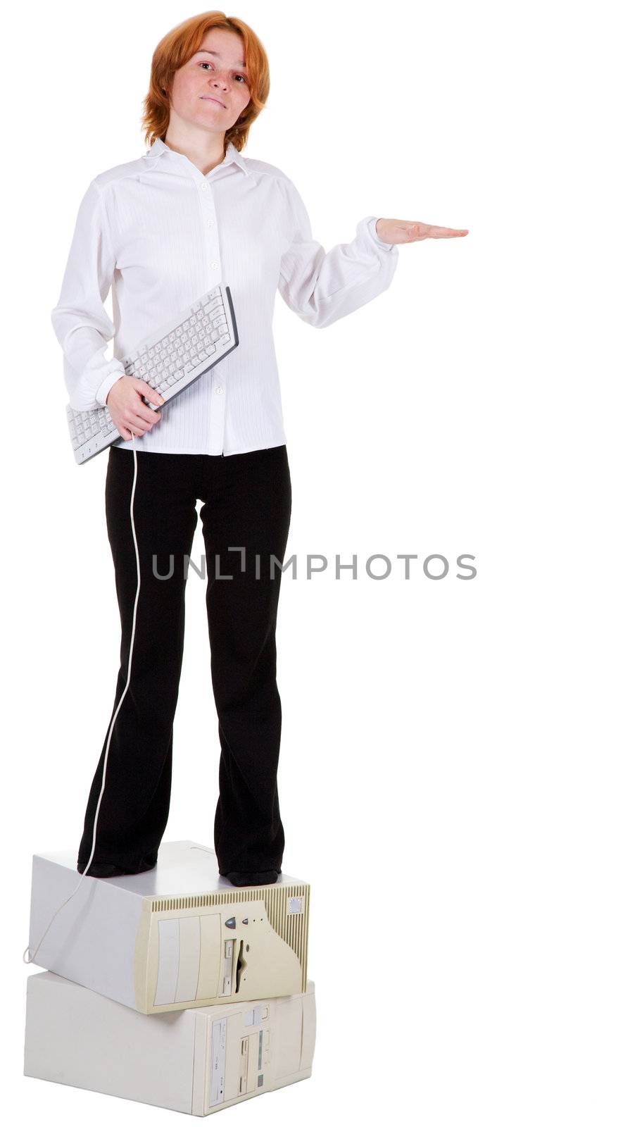 The girl standing on two computers with the keyboard