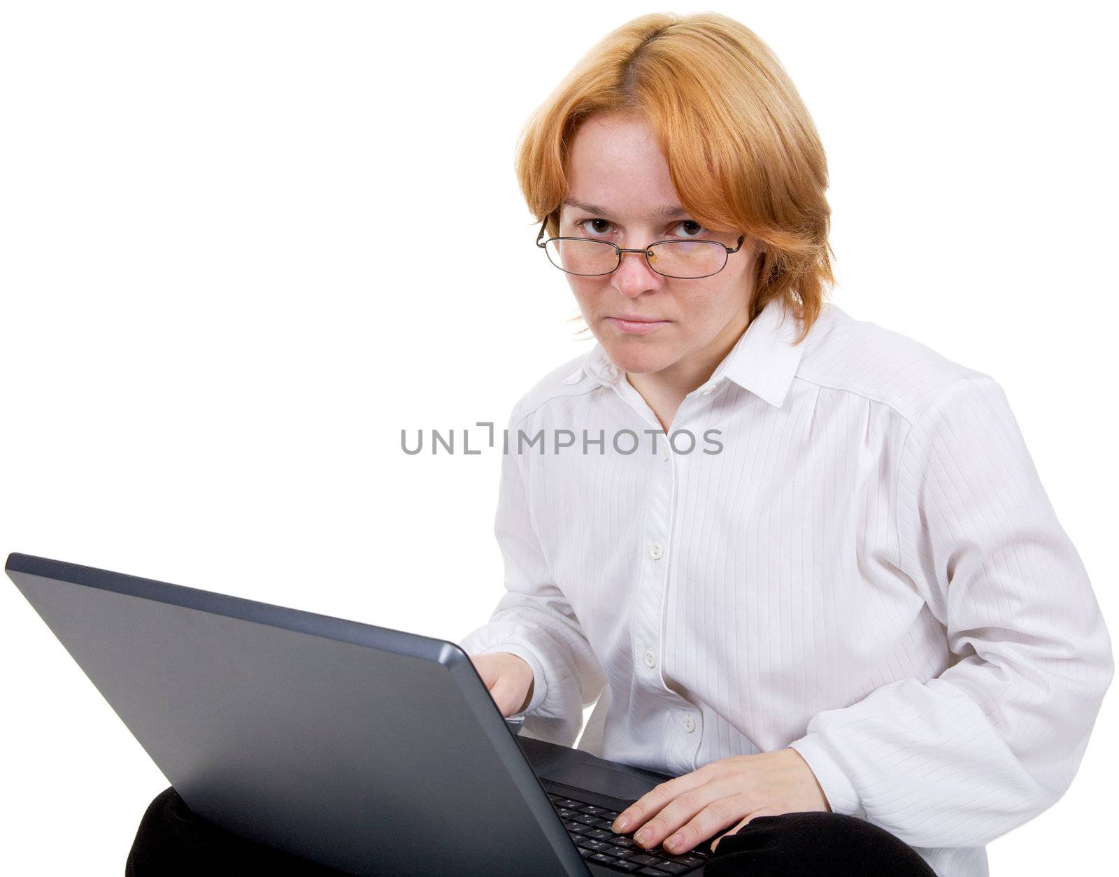 Girl working on the black notebook on a white background