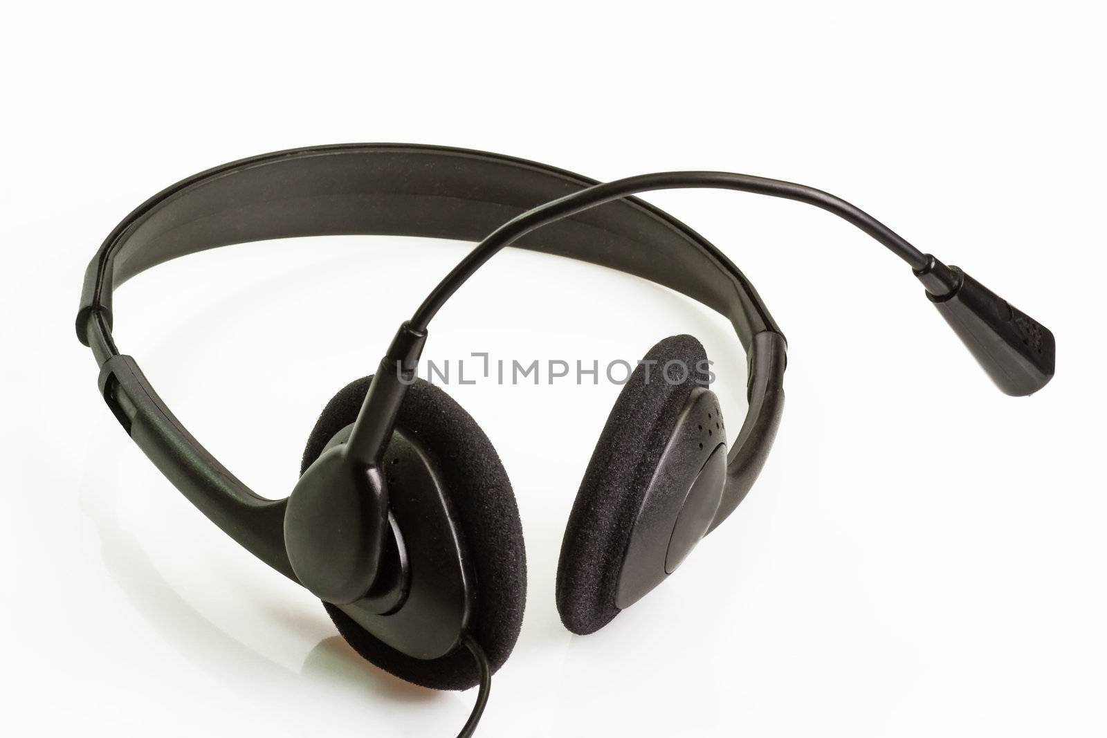 A computer headset on bright background.
