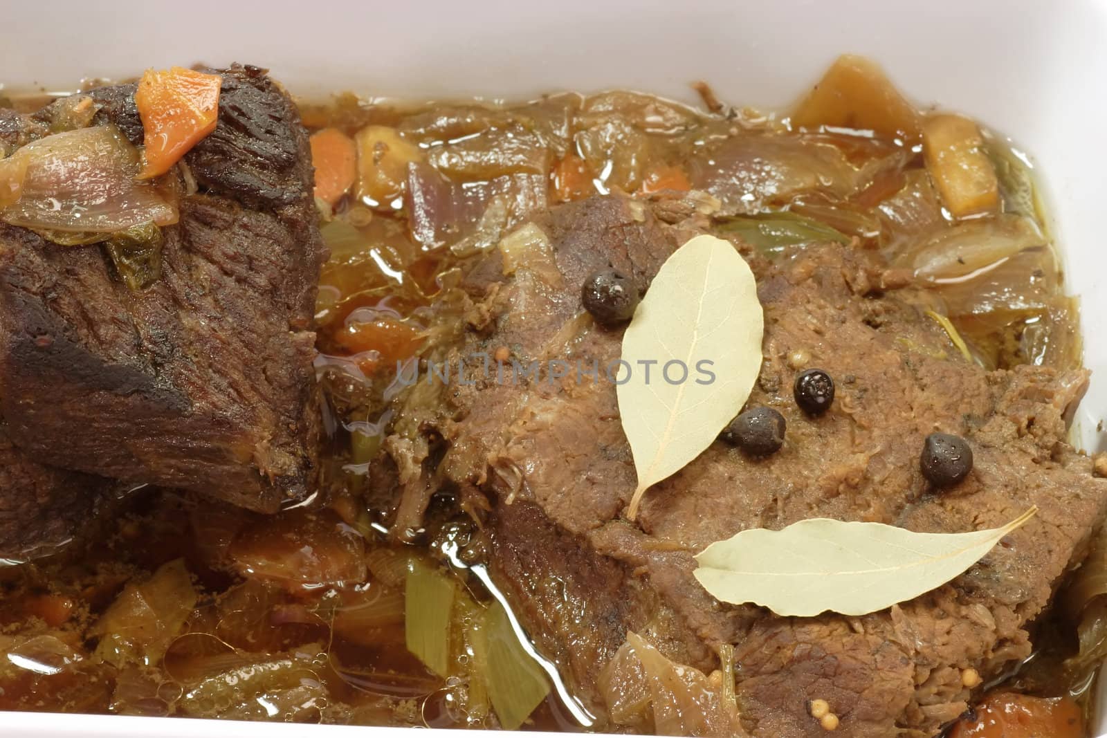 Marinated beef in detail on bright background