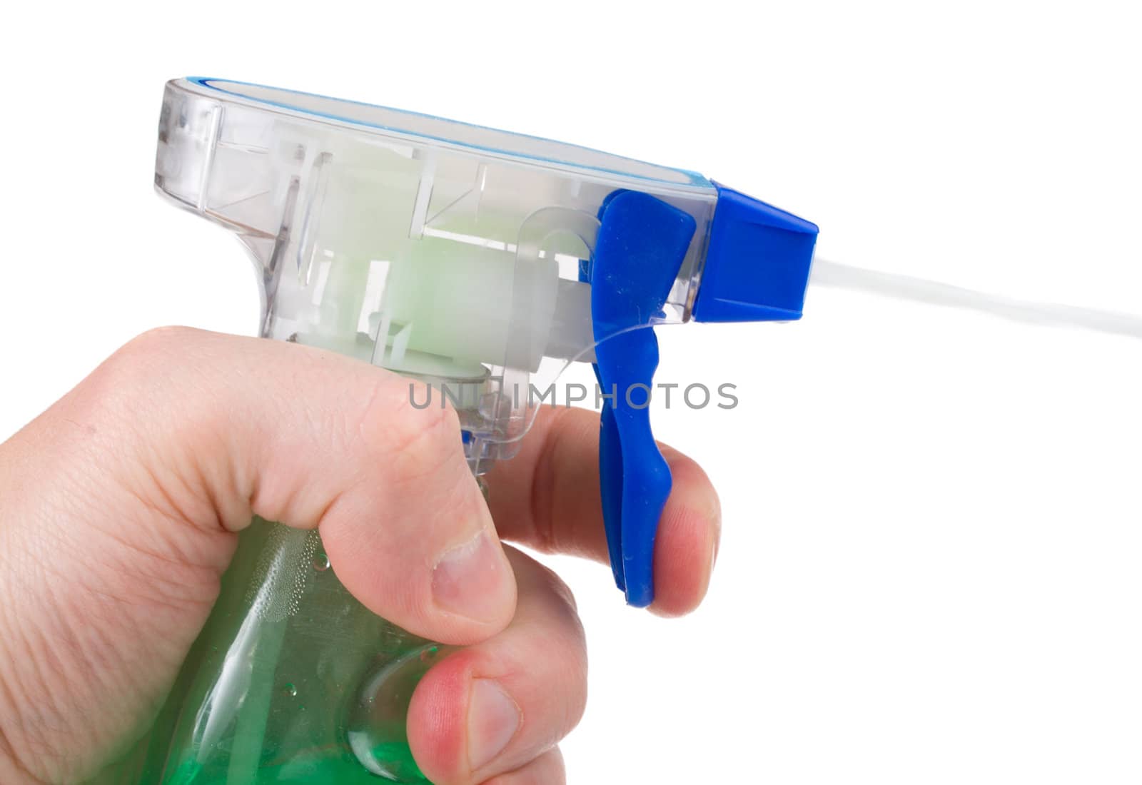 spray bottle in hand with stream, isolated on white