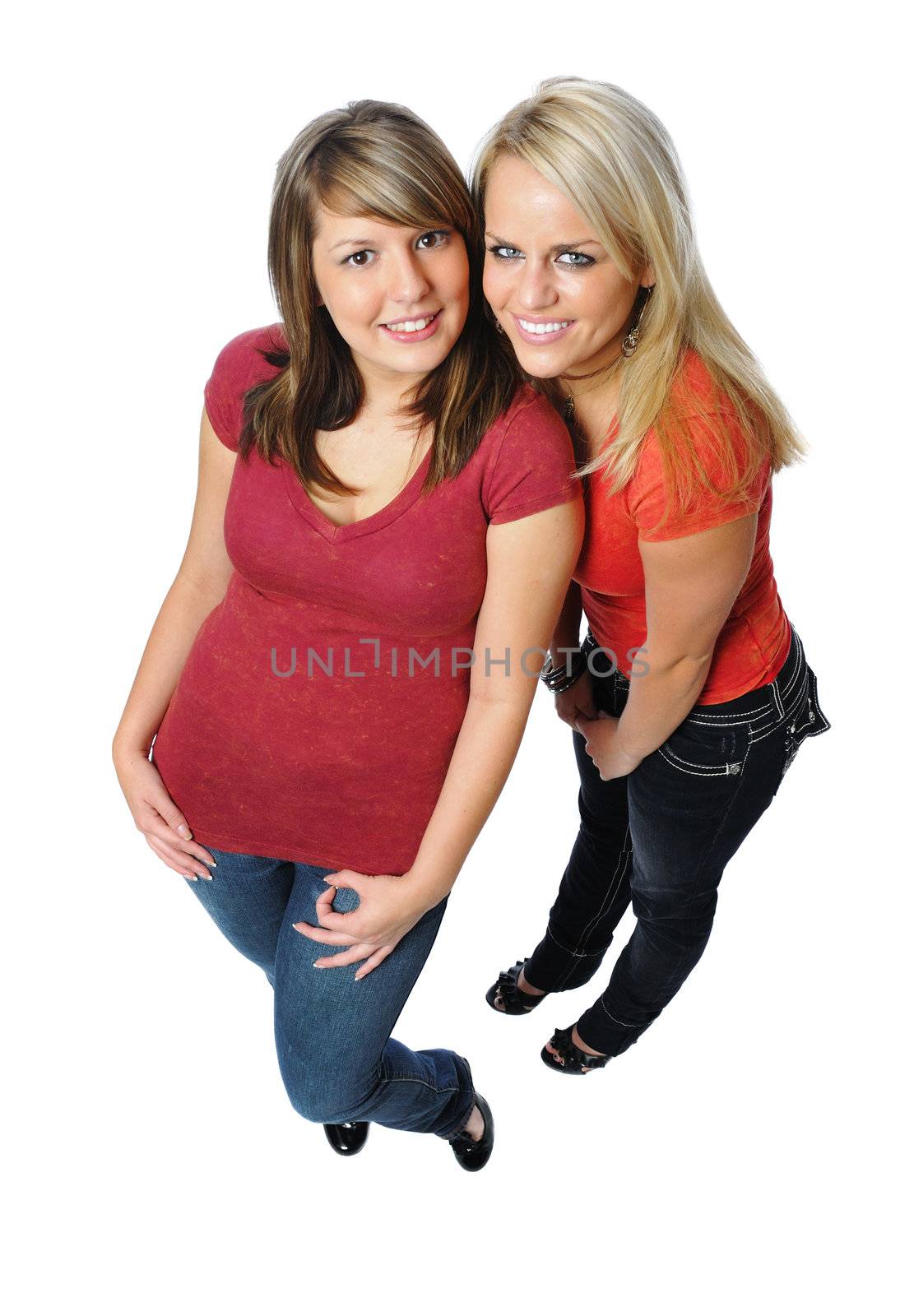 two friends posing together on a white background