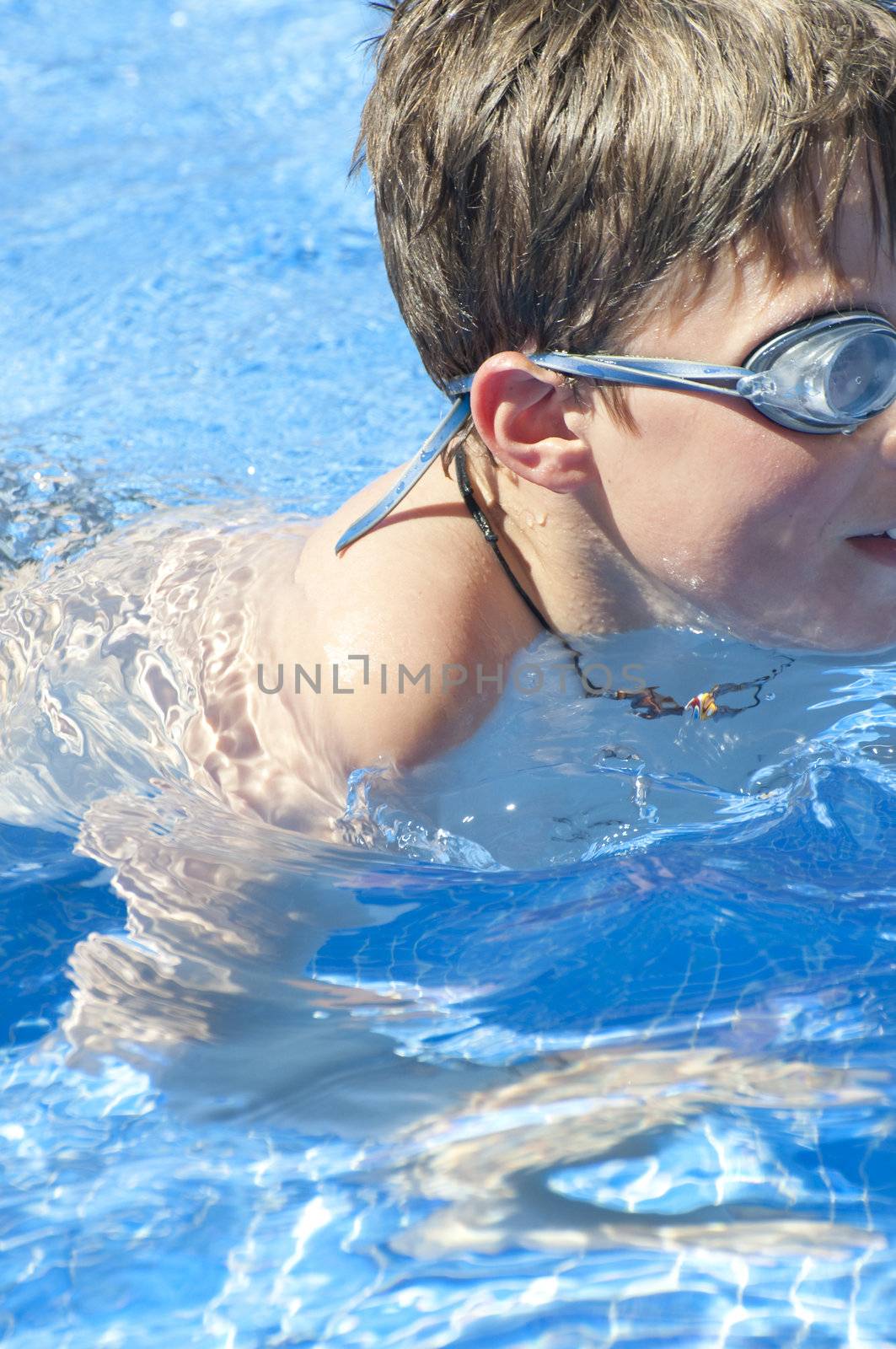 Picture of a boy on a swimming pool