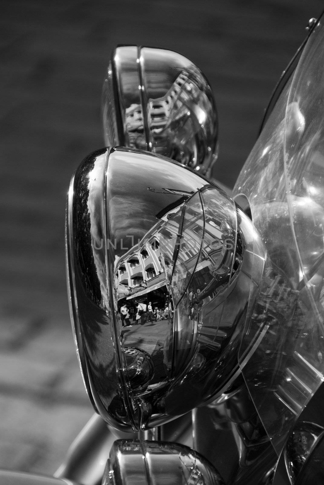 Motorbike Lamp City Reflection in a Street of Oslo, Norway