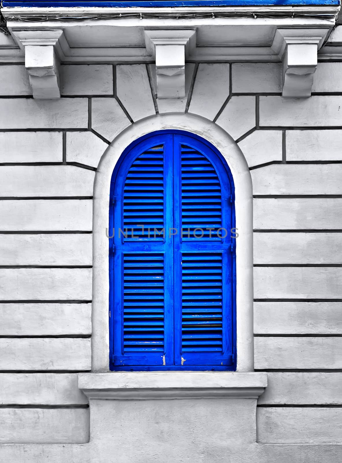 A blue louvered window