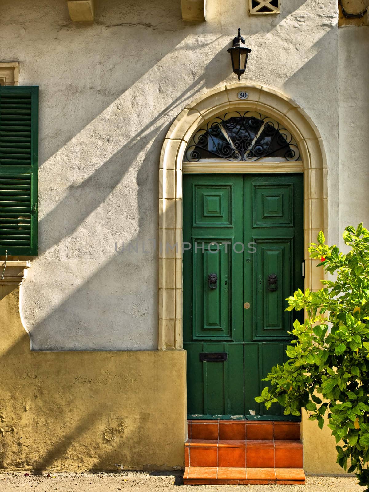 Typical features on a facade of a house in Malta 