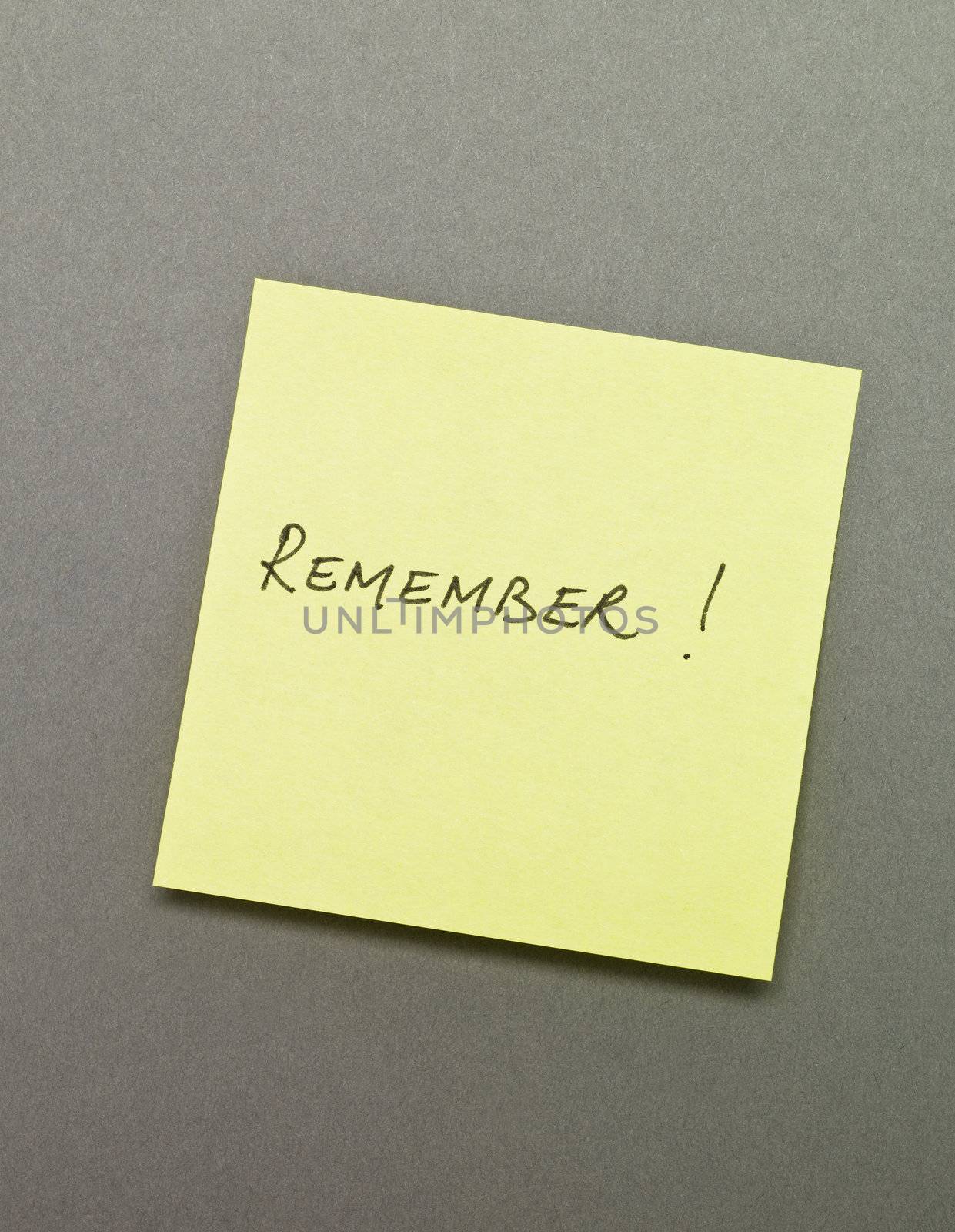 Adhesive Note with "Remember" wrote on it