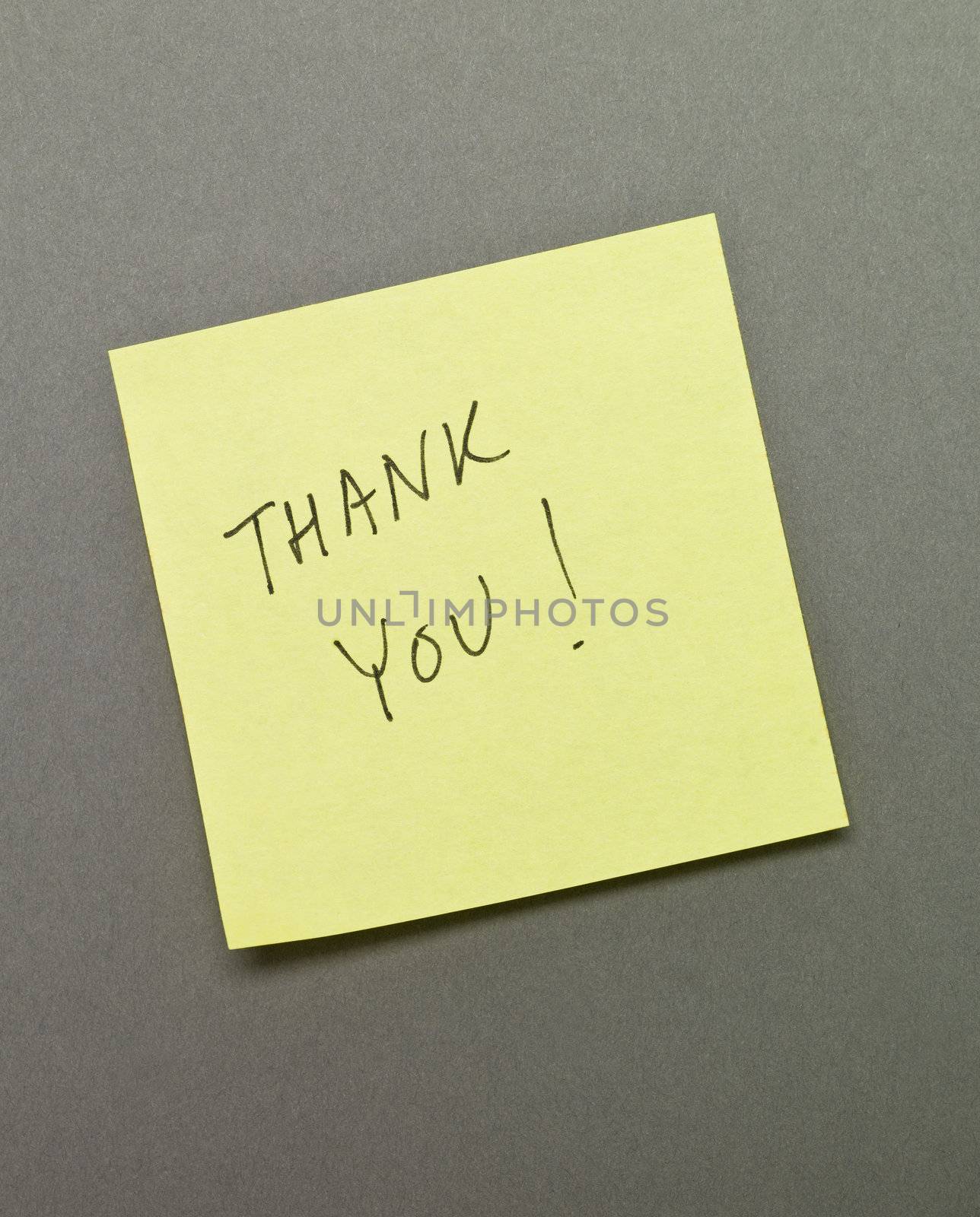 Adhesive Note with "Thank You" wrote on it