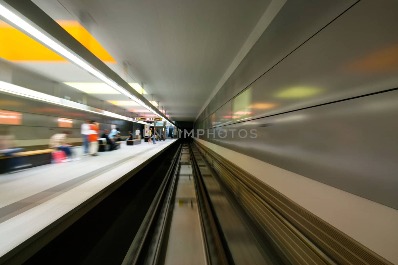 Motion blurred train station by svenmorris